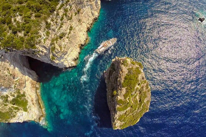 Paxos Antipaxos Blue Caves Day Tour from Corfu - Mesovrika Beach: snorkel time in turquoise water