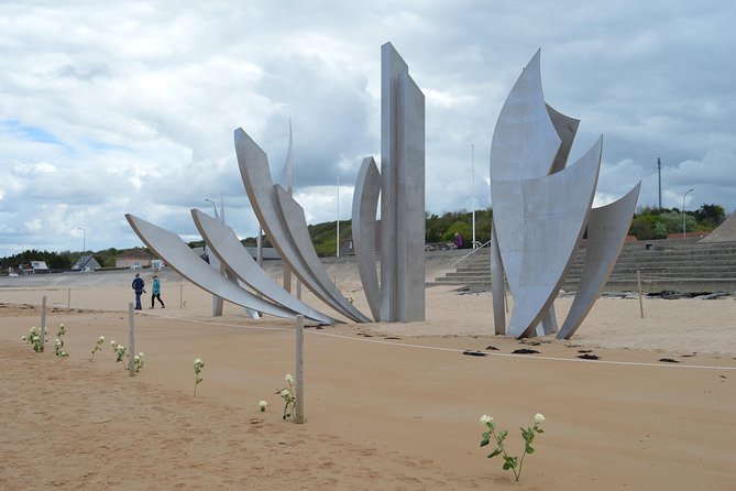 Private guided American D-Day Tour from Bayeux - The Normandy American Cemetery: reflection, flags, and Taps