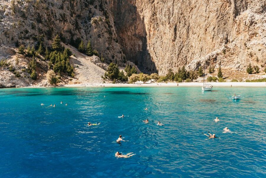 Rhodes: Symi Island & Panormitis Monastery Day Trip by Boat - Meeting Mandraki Port: the red sign, the map, and being early
