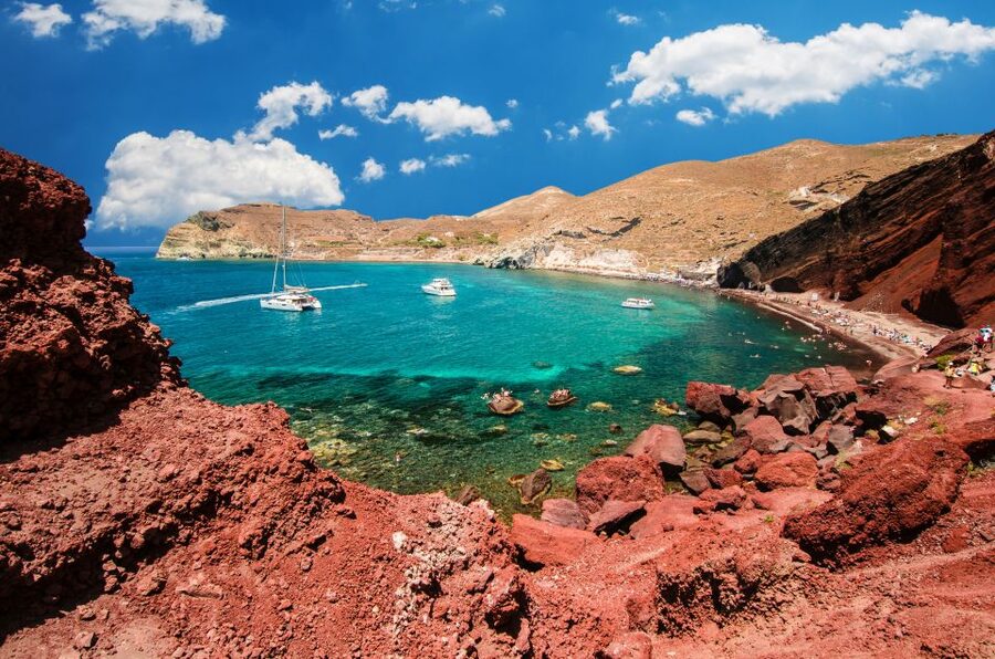 Santorini: Island Highlights Guided Day Trip with Oia Sunset - Red Beach Views: Colorful Rock Drama with Free Time