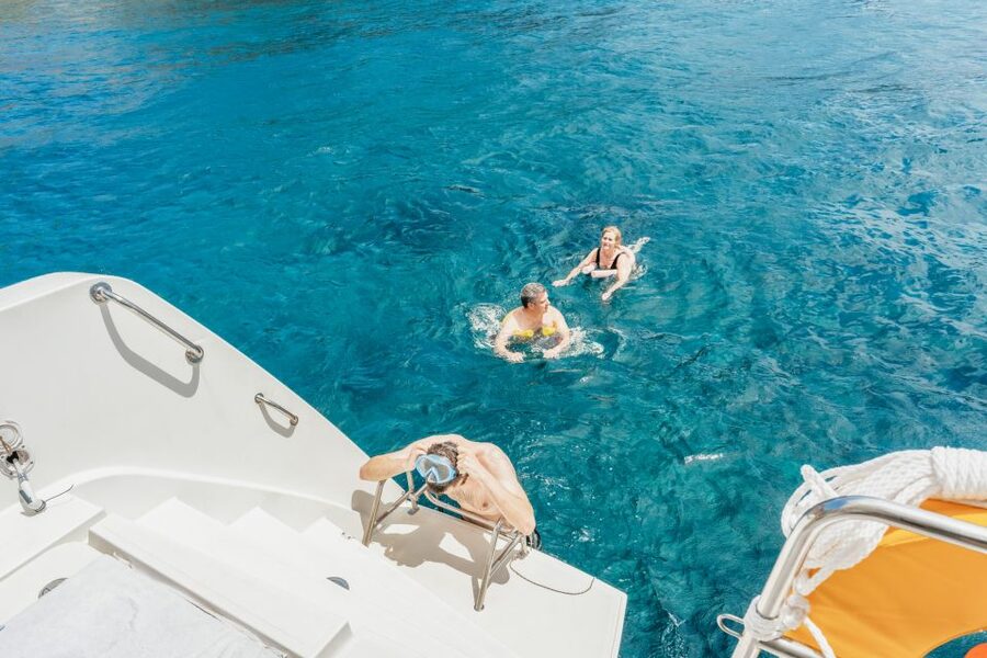 Santorini: Luxury Catamaran Day Trip with Meal and Open Bar - Sunset Oia versus morning sails: choosing the option that fits your style