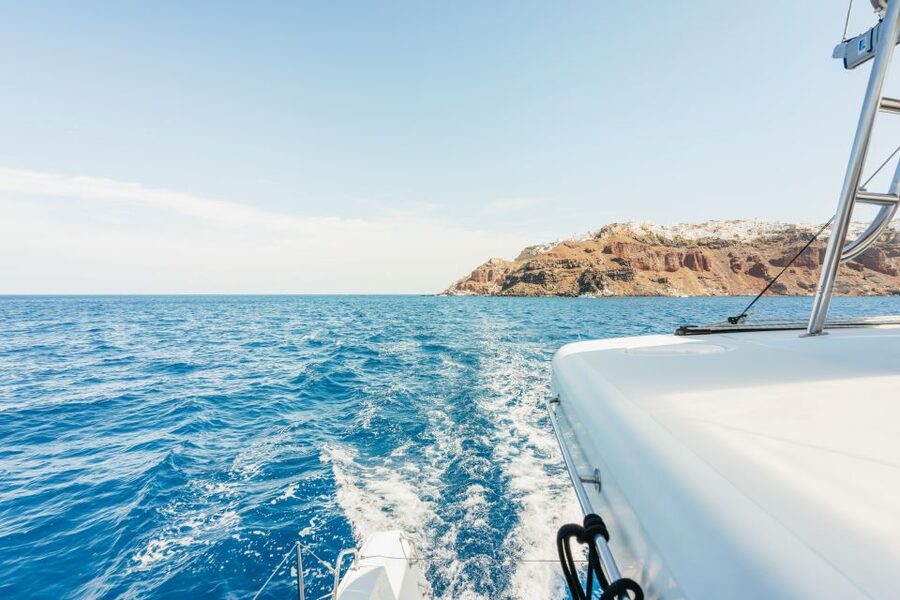 Santorini: Luxury Catamaran Day Trip with Meal and Open Bar - The hot springs stop: 30 minutes, 50 meters away, and how to enjoy it