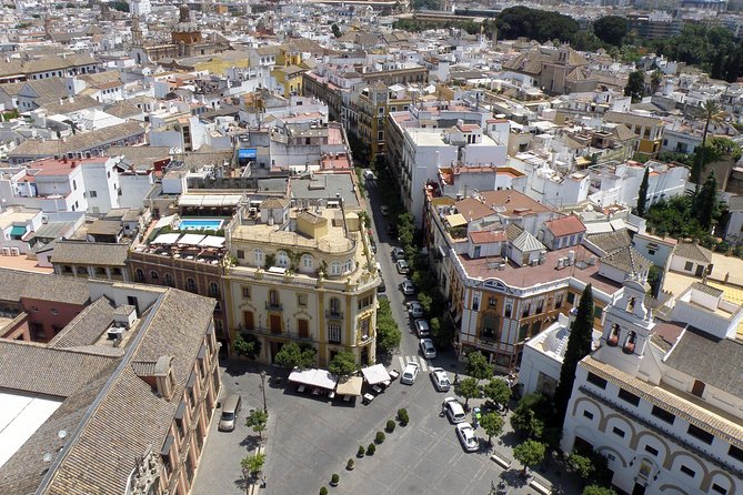 Seville Day Trip from the Algarve - Santa Cruz: cobblestones, flower-smelling lanes, and snack breaks