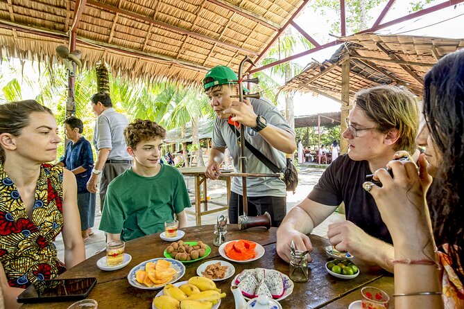 Small-Group Mekong Delta Day Trip: Boat Ride, Cottages & Pagoda - Vĩnh Tràng Pagoda: The Cultural Anchor of the Day