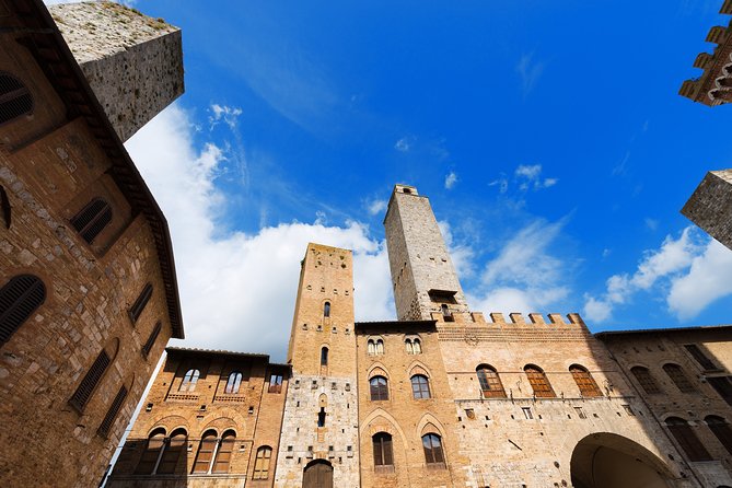 Small-Group San Gimignano and Volterra Day Trip from Siena - Lunch at a Family-Run Farm: Saffron, Cheese, Prosciutto, and Vernaccia