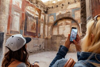The Ultimate Ruins of Pompeii and Herculaneum Private Day Trip - Pompeii Highlights: Theater, Baths, Brothel, and the Forum Story