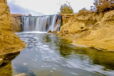 Valley of Whales and Wadi El Rayan Water Falls Day Tour from Cairo - Tunis Village in Fayoum: salt-lake views and a calm start
