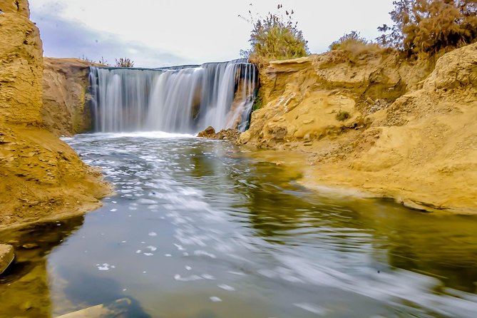 Valley of Whales and Wadi El Rayan Water Falls Day Tour from Cairo - Tunis Village in Fayoum: salt-lake views and a calm start