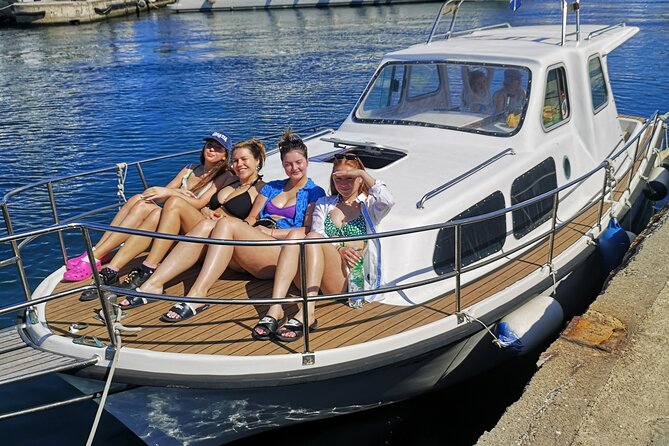 Visit 2 Islands of Zadar on a traditional wooden boat during half-day trip - Stop one: Preko island for sandy beach breaks and easy wandering